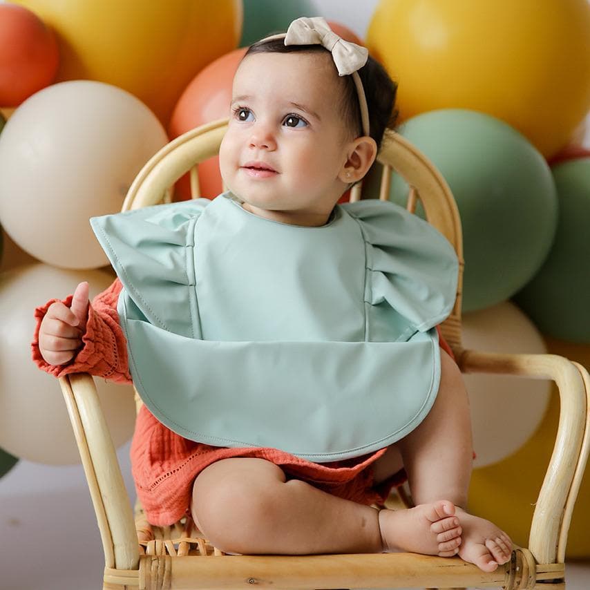 Snuggle Waterproof Bib in Sage Frill